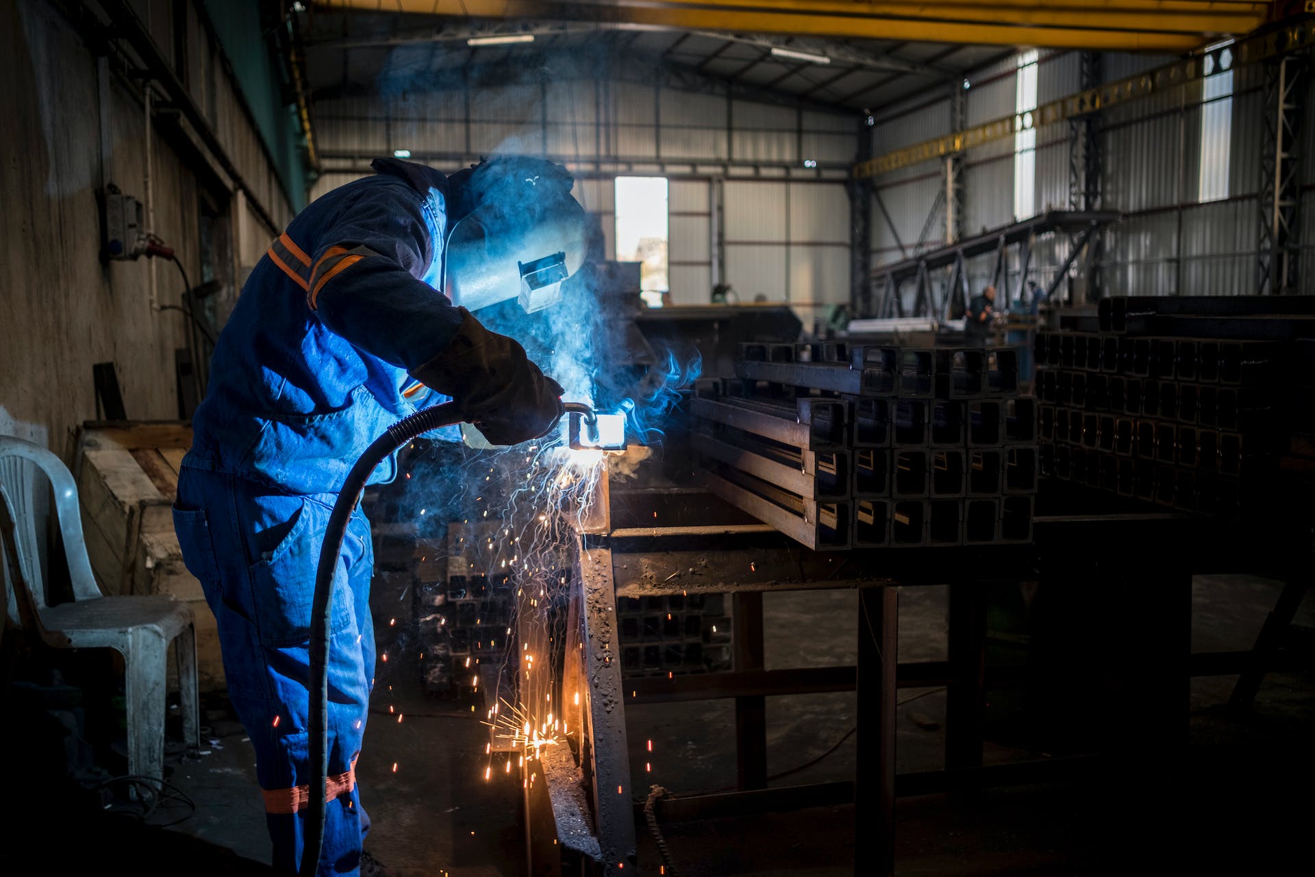 Man doing welding.